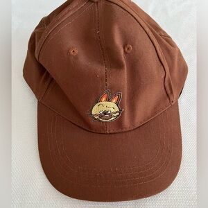 Funimation monster hunter stories brown hat.